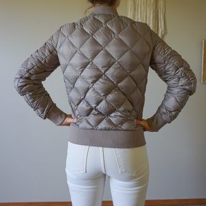 Tan puffer jacket. Size small